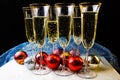 New years glasses and toys on the table. Royalty Free Stock Photo