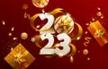 New Years 2023. Greeting card design with 3D numeral, ribbon, gift boxes and christmas decoration Royalty Free Stock Photo