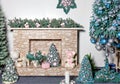 New Years holiday, fireplace with gifts, decorative Christmas trees, toys, balls and fir branches