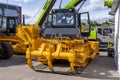 New yellow crawler bulldozer with ripper, rear view. Sale of new construction and municipal equipment at a dealership or Royalty Free Stock Photo