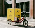 New yellow La Poste postal bike with electric motor and big Eco Logic