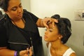 NEW YORK - AUGUST 08: Model getting ready backstage at Top Model Latina 2014 Royalty Free Stock Photo