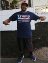 President Donald Trump supporter wears t-shirt with sign `Trump is my President`