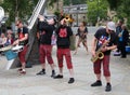 The new york brass band playing in the town square at the hebden bridge public arts festival