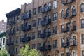 New York brick buildings with outside fire escape stairs