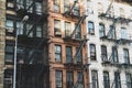 New York brick buildings with outside fire escape stairs