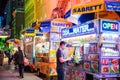 New York, Broadway at night. Take away fast food kiosks selling hot dog