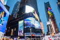 New York, Broadway streets at night. Illuminated high buildings, colorful neon lights, ads Royalty Free Stock Photo