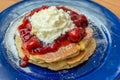 New York Cheesecake Pancake. Pancake with cream cheese, strawberry jam and powder sugar.