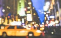 New York City Abstract Rush Hour - Defocused Yellow Taxicab Car And Traffic Jam On 5th Avenue In Manhattan Downtown At Blue Hour