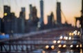 Aerial view over manhattan with brooklyn bridge blurred lights night view skyline, abstract background