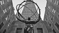 NEW YORK CITY - Atlas statue by Lee Lawrie in front of Rockefeller Center with art deco building in background in m Royalty Free Stock Photo