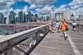 NEW YORK CITY, AUG 14 - Tourists enjoy Brooklyn Bridge, August 14, 2009 in New York City. More than 50 million people visit New Royalty Free Stock Photo