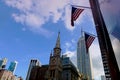 New York City - August 25, 2018: Empire State Building and US Flags Royalty Free Stock Photo