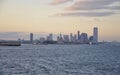 New York City,August 2nd:New Jersey City skyline and Statue of Liberty at sunset over Hudson river Royalty Free Stock Photo