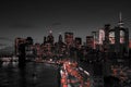 New York City black and white night skyline with red lights glowing in downtown Manhattan Royalty Free Stock Photo