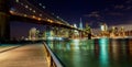 New York City Brooklyn Bridge and Manhattan skyline Hudson River illuminated Royalty Free Stock Photo