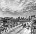 New York City Brooklyn Bridge traffic at night Royalty Free Stock Photo