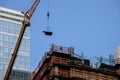 New York City building crane and buildings under construction against blue sky Royalty Free Stock Photo