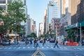 New York City, 2018: Crowds of people walk across the bus Royalty Free Stock Photo