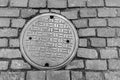 New York City Cobblestone Street and Manhole Cover Royalty Free Stock Photo