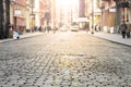 New York City - Cobblestone street view in Soho with bright sunlight background Royalty Free Stock Photo
