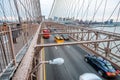 New York City, New York - December 6, 2018: Car traffic along Brooklyn Bridge on a cloudy day Royalty Free Stock Photo