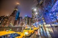 New York City - December 2, 2018: Columbus Circle skyscrapers and taxi cabs at night, Midtown Manhattan Royalty Free Stock Photo