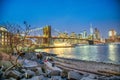 NEW YORK CITY - DECEMBER 6TH, 2018: Night view of Brooklyn Bridge and Lower Manhattan from Brooklyn district, New York City Royalty Free Stock Photo