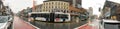 NEW YORK CITY - DECEMBER 2, 2018: Tourists walk along Harlem streets on a rainy day, panoramic view. The city attracts 50 million