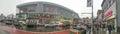 NEW YORK CITY - DECEMBER 2, 2018: Tourists walk along Harlem streets on a rainy day, panoramic view. The city attracts 50 million Royalty Free Stock Photo