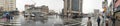 NEW YORK CITY - DECEMBER 2, 2018: Tourists walk along Harlem streets on a rainy day, panoramic view. The city attracts 50 million