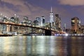 New York City, financial district in lower Manhattan with Brooklin Bridge at night, USA Royalty Free Stock Photo