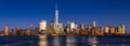 New York City Financial District skyline at twilight across the Hudson River