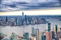 New York City from helicopter point of view. Downtown Manhattan, Jersey City and Hudson River on a cloudy day