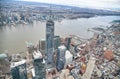 New York City from helicopter point of view. Downtown Manhattan skyscrapers on a cloudy day