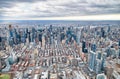 New York City from helicopter point of view. Midtown Manhattan skyscrapers on a cloudy day