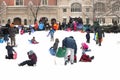 New York City - January 27: Kids play in the snow on the day of the expected blizzard in NYC