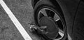 NEW YORK CITY - JUNE 2013: Car wheel blocked by police along a city street