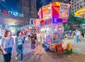 NEW YORK CITY - JUNE 8, 2013: Tourists and locals near street food vendor. New York is visited by more than 50 million people ann Royalty Free Stock Photo