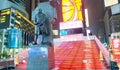 NEW YORK CITY - JUNE 8, 2013: Tourists walk in Duffy Square at n Royalty Free Stock Photo