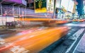 NEW YORK CITY - JUNE 2013: Yellow cab speeds up along city streets. There are more than 10000 taxis in New York Royalty Free Stock Photo