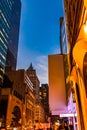 New York City, Madison Avenue - November 1, 2017: Fendi store and other classic buildings glow in golden light at night Royalty Free Stock Photo
