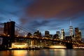 New York City Manhattan Downtown with Brooklyn Bridge at dusk Royalty Free Stock Photo