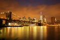 New York City Manhattan Downtown with Brooklyn Bridge at dusk Royalty Free Stock Photo