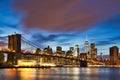 New York City Manhattan Downtown with Brooklyn Bridge at Dusk Royalty Free Stock Photo
