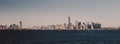 New York City Manhattan downtown skyline at dusk with skyscrapers illuminated over Hudson River panorama. Royalty Free Stock Photo