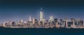 New York City Manhattan downtown skyline at dusk with skyscrapers illuminated over Hudson River panorama. Royalty Free Stock Photo