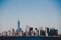 New York City Manhattan downtown skyline at dusk with skyscrapers illuminated over Hudson River panorama. Royalty Free Stock Photo