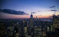 New York City. Manhattan downtown skyline with illuminated Empire State Building and skyscrapers at dusk. Royalty Free Stock Photo